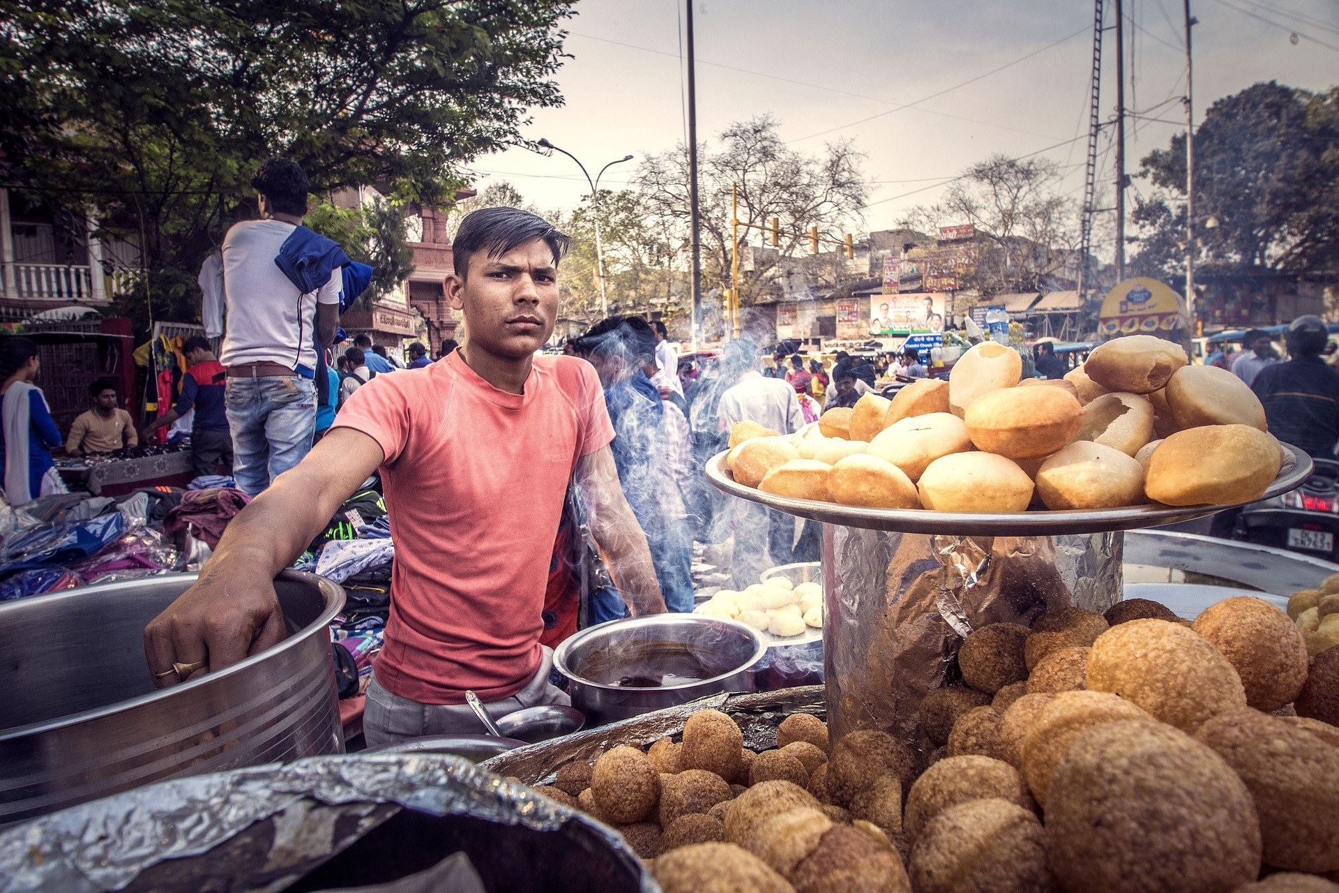 pani puri or gol gappe being cooked by street vendor Deli India