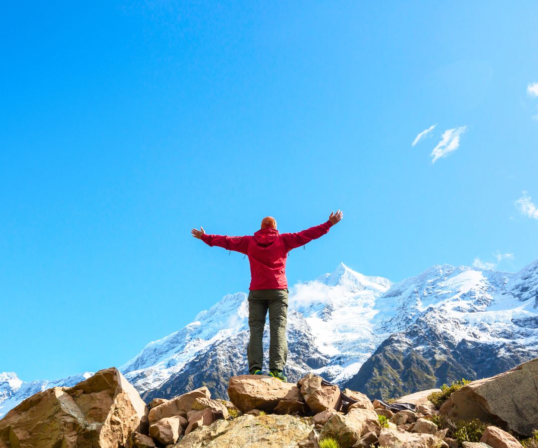 hiker-on-top-of-mountain