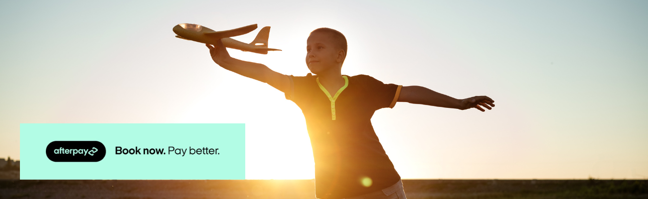 young-boy-playing--with-toy-plane-afterpay-banner