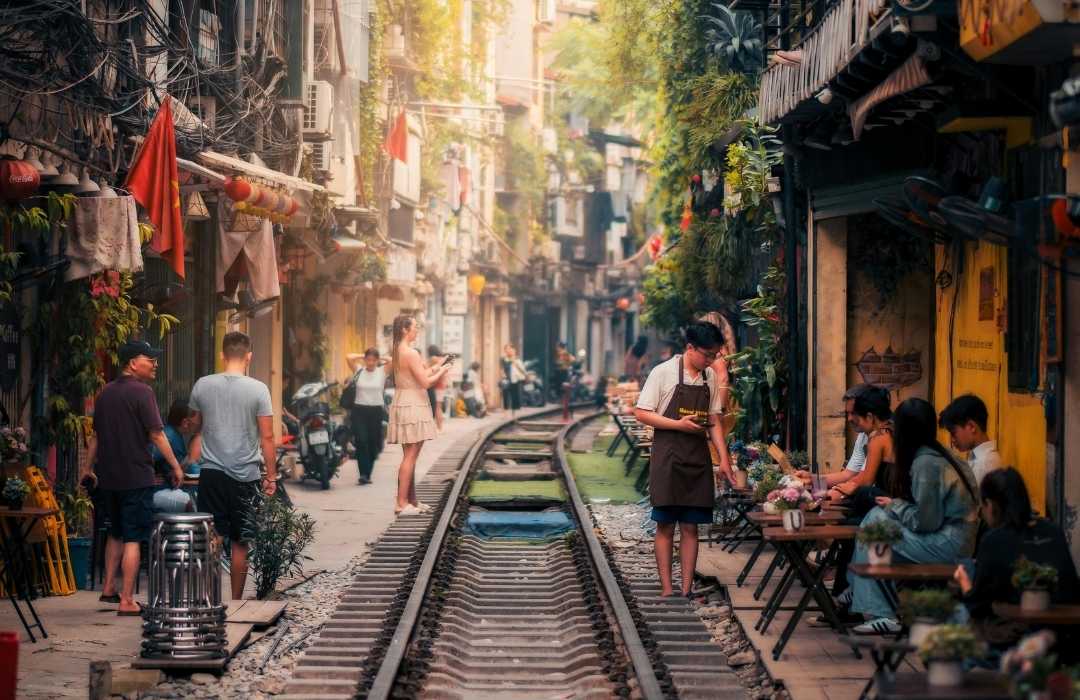 people-at-hanoi-train-tracks-market