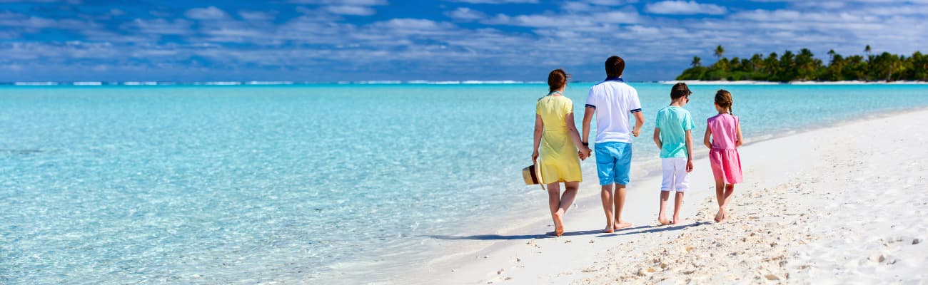 family-on-tropical-beach-vacation