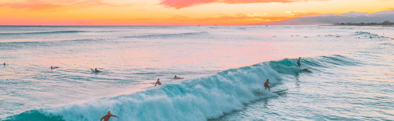 hawaii-surfers-at-sunset