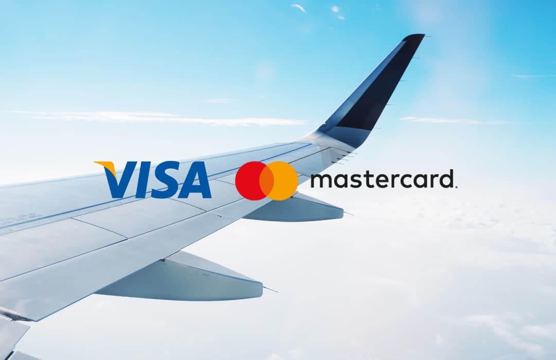 Plane-wing-with-visa-and-mastercard-logo-on-it