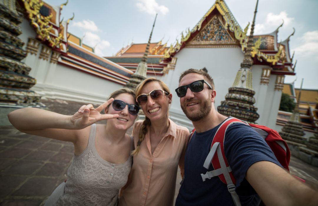 Friends-taking-a-selfie-in-asia